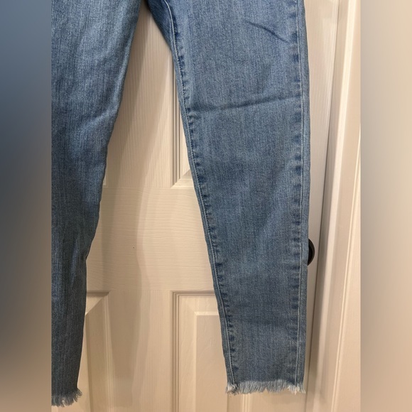 Blue Ankle Jeans with Fringe Bottoms - Picture 4 of 9